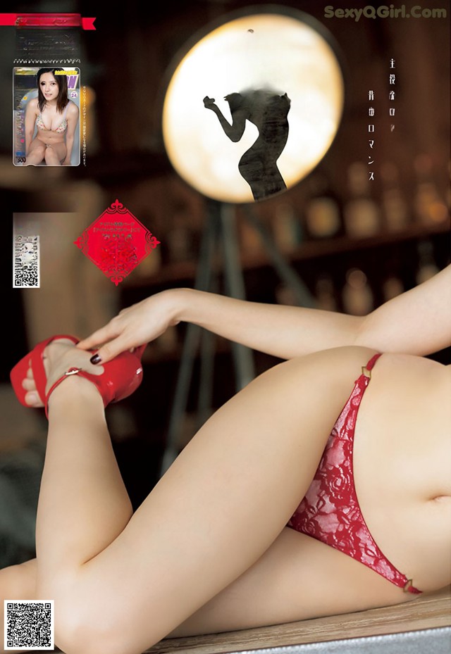 A woman in a red lingerie and red high heels.