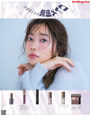 A magazine page with a picture of a girl in a heart shaped frame.